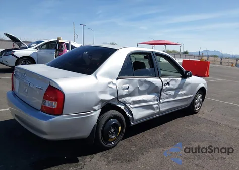 2001 Mazda Protege Dx/Lx из США, поврежденный, VIN JM1BJ222610424154